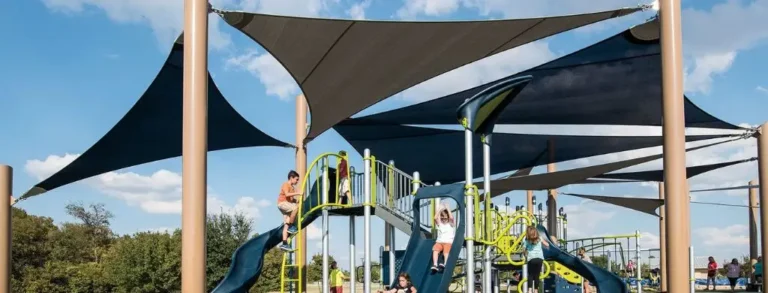 Typical playground shade covering playgrounds. Perfect for canopy drone cleaning.